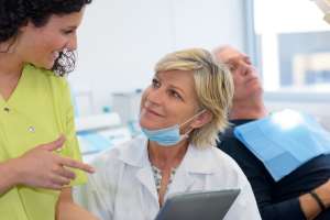 dentist assistant and patient