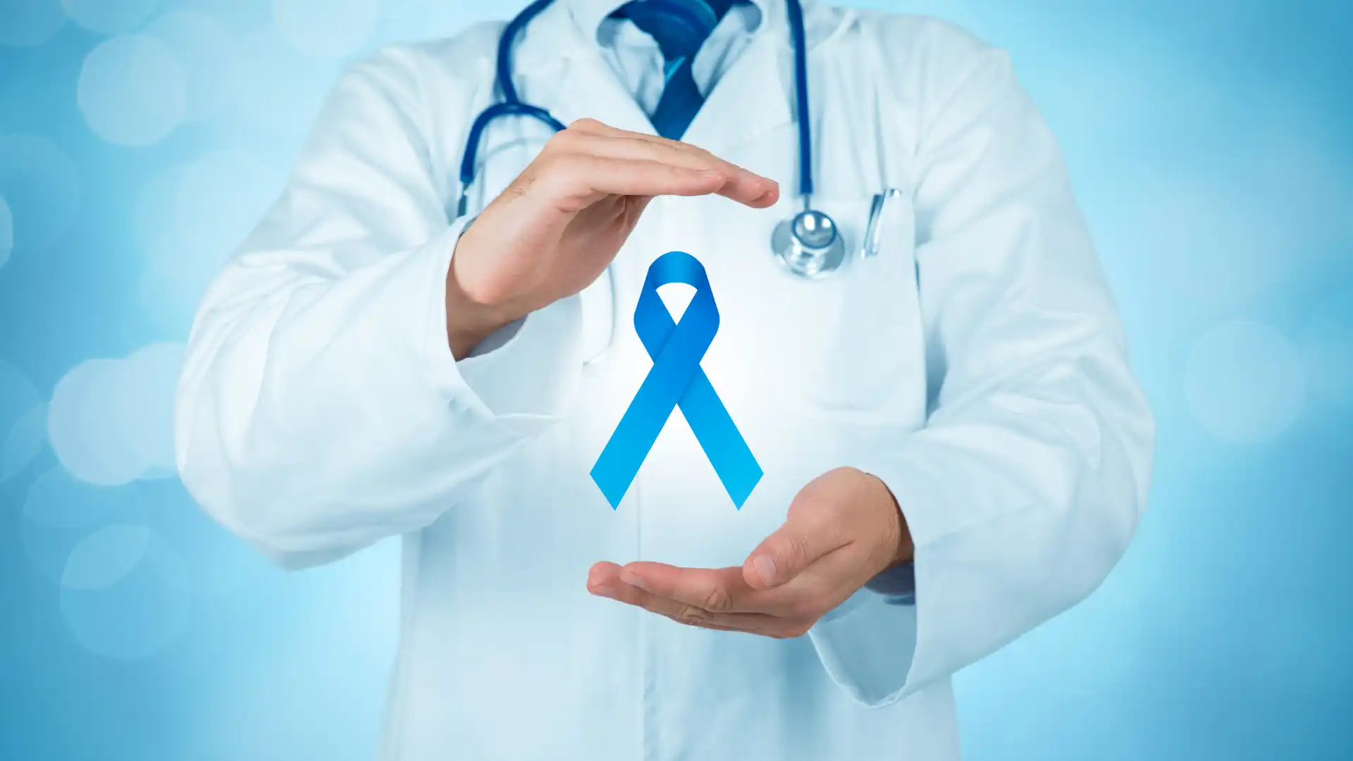 Doctor holding a blue ribbon symbolizing awareness.