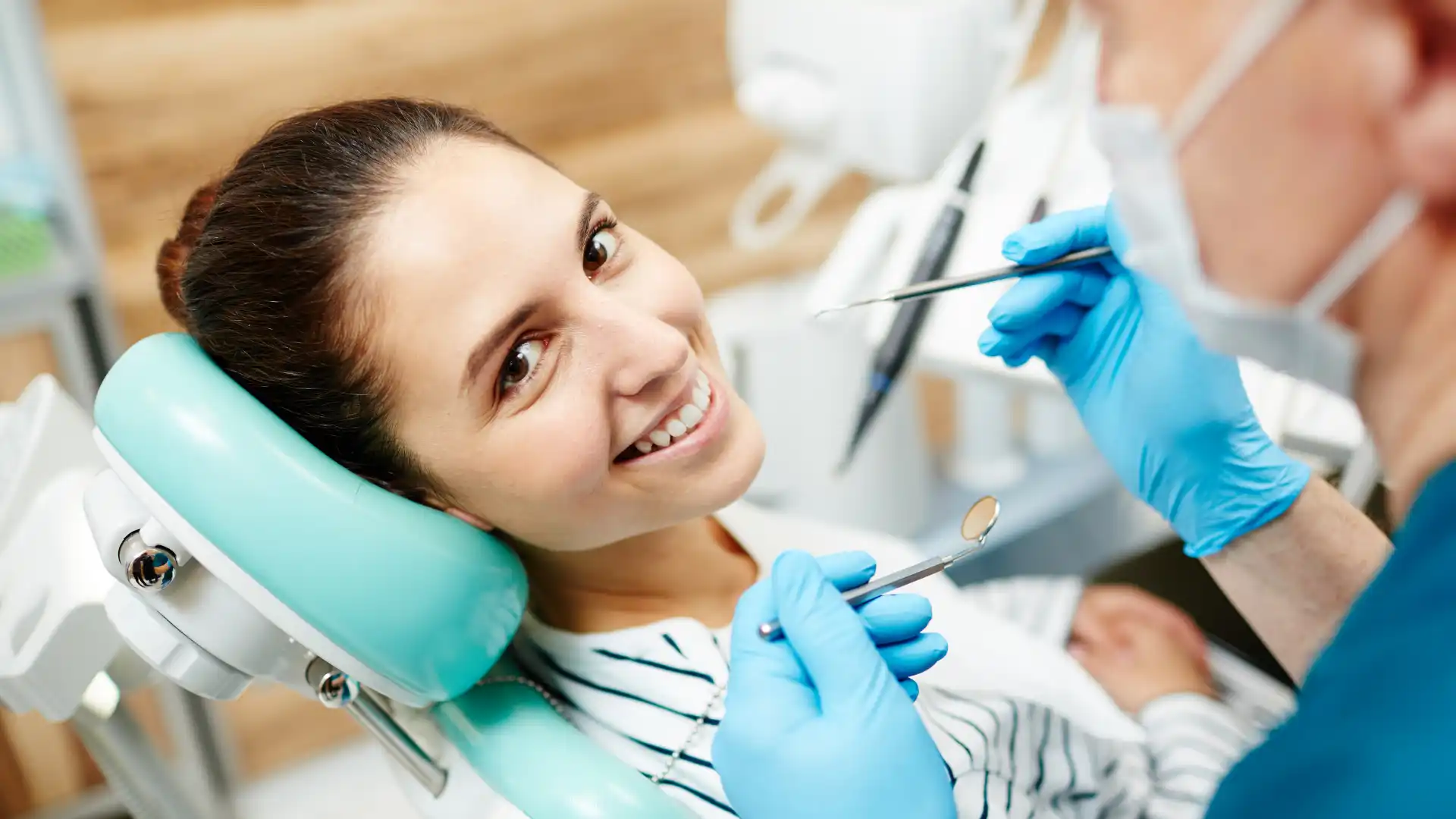 Smiling woman at the dentist's office during a checkup