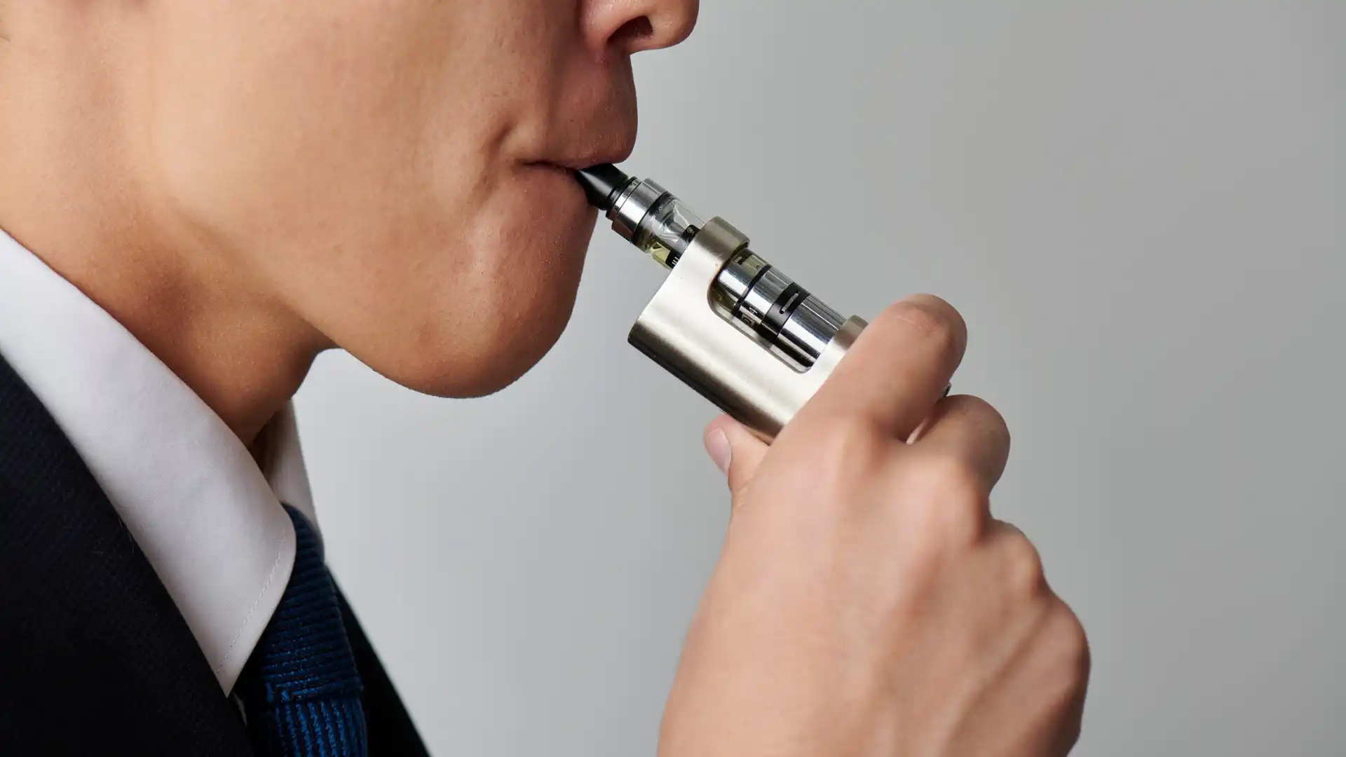 Person using a vape device."