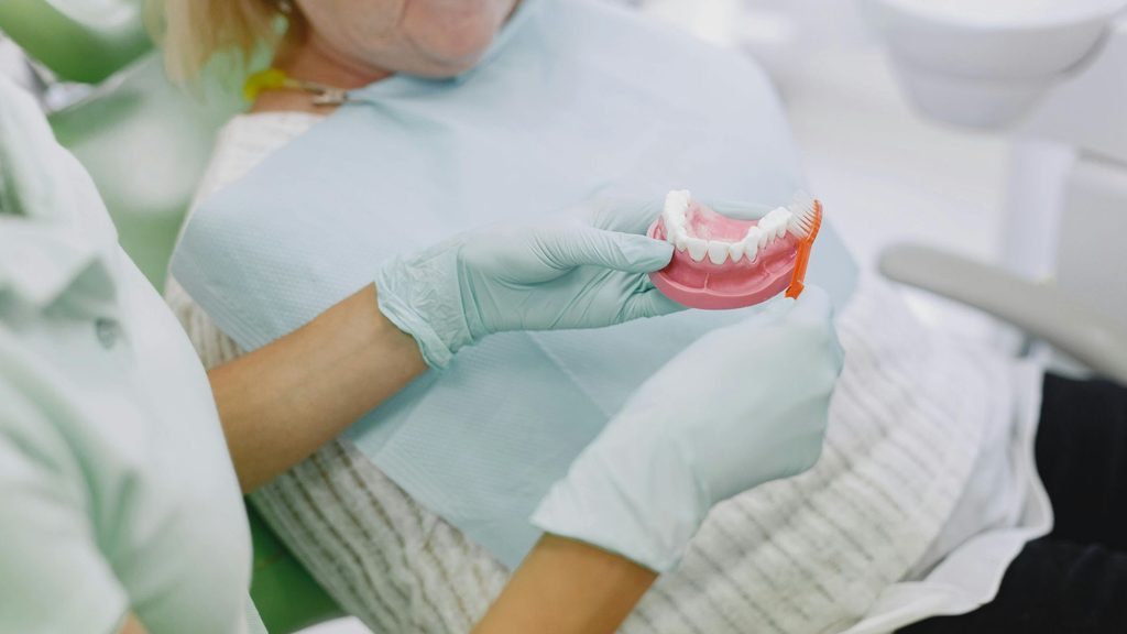 Snap-In Dentures in Patchogue: Implant-Retained Dentures Compared to Traditional Ones_images
